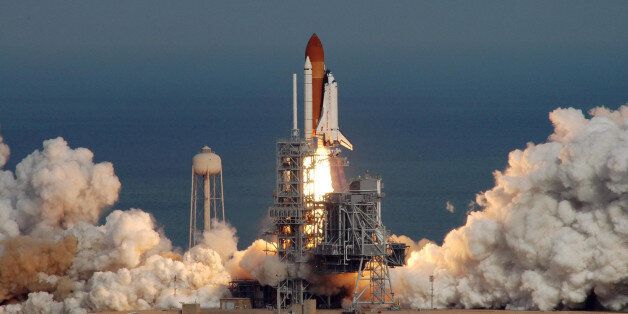 Against the blue of the Atlantic Ocean, space shuttle Atlantis with its crew of seven rises majestically from Launch Pad 39A at NASA's Kennedy Space Center to start the STS-122 mission to the International Space Station. The launch was the third attempt fo