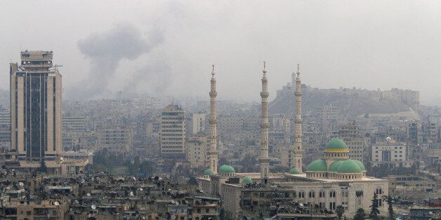 Smoke rises after strikes on Aleppo, Syria December 5, 2016. REUTERS/Omar Sanadiki