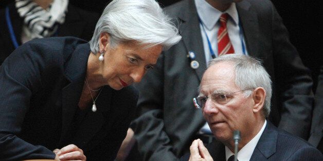 France's Finance Minister Christine Lagarde, left, talks with Germany's Finance Minister Wolfgang Schauble, before a meeting of the G-20 at the World Bank/IMF Spring Meetings 2011 in Washington, Friday, April 15, 2011. (AP Photo/Jacquelyn Martin)
