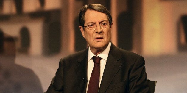 Nikos Anastasiadis, one of the two remaining candidates in the Cypriot presidential election, attends the last televised political debate in Nicosia, on February 22, 2013 ahead of the scheduled elections on February 24. AFP PHOTO / YIANNIS KOURTOGLOU (Photo credit should read Yiannis Kourtoglou/AFP/Getty Images)