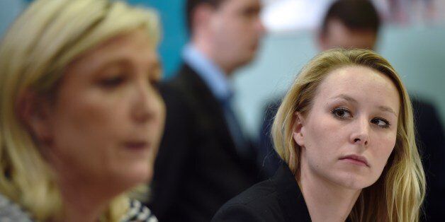 France's far-right National Front (FN) party MP Marion Marechal Le Pen (R) gives a press conference with the party's leader Marine Le Pen on March 17, 2015 in Le Pontet, southern France, ahead of the March 22 and 29 departemental local elections. AFP PHOTO / ANNE-CHRISTINE POUJOULAT (Photo credit should read ANNE-CHRISTINE POUJOULAT/AFP/Getty Images)