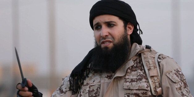 An image grab taken from a propaganda video released by the Islamic State (IS) group media office in Iraq's Nineveh province on July 20, 2016, allegedly shows Rachid Kassim, a French member of the Islamic State group (IS), speaking in French to the camera from an undisclosed location before beheading two men along with another jihadist. / AFP / Welayat Nineveh / - / RESTRICTED TO EDITORIAL USE - MANDATORY CREDIT 'AFP PHOTO / HO / WELAYAT NINEVEH' - NO MARKETING NO ADVERTISING CAMPAIGNS - DISTRIBUTED AS A SERVICE TO CLIENTS FROM ALTERNATIVE SOURCES, AFP IS NOT RESPONSIBLE FOR ANY DIGITAL ALTERATIONS TO THE PICTURE'S EDITORIAL CONTENT, DATE AND LOCATION WHICH CANNOT BE INDEPENDENTLY VERIFIED (Photo credit should read -/AFP/Getty Images)