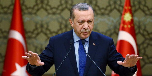 Turkey's President Recep Tayyip Erdogan addresses local administrators in Ankara, Turkey, Wednesday, Dec. 7, 2016. (Kayhan Ozer, Presidential Press Service, Pool photo via AP)