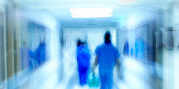 Hospital personnel in a hallway