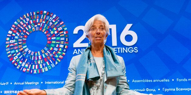 FILE - In this Oct. 8, 2016 file photo, International Monetary Fund (IMF) Managing Director Christine Lagarde gestures after speaking at the International Monetary and Financial Committee (IMFC) conference at World Bank/IMF Annual Meetings in Washington. Lagarde was named one of Glamour's Women of the Year, Tuesday, Nov. 1, and will be honored at a ceremony in Los Angeles on Nov. 14. (AP Photo/Jose Luis Magana, File)