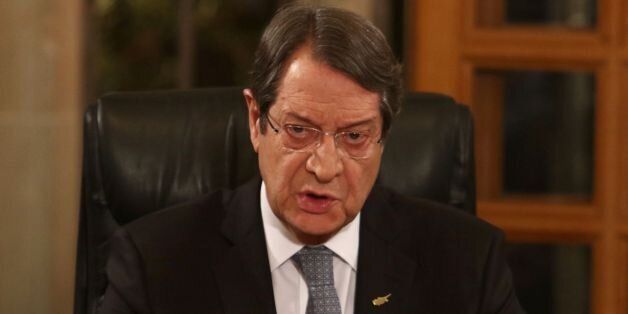 Cypriot President Nicos Anastasiades talks during a televised press conference at the Presidential Palace in Nicosia on November 4, 2016, ahead of a five-day summit in Geneva aimed at reunifying the Mediterranean island.UN chief Ban Ki-moon is to open a five-day summit in Geneva on November 7 between Turkish Cypriot leader Mustafa Akinci and his Greek Cypriot counterpart Anastasiades for talks billed as the last best chance for an enduring peace deal. / AFP / POOL / YIANNIS KOURTOGLOU (Photo credit should read YIANNIS KOURTOGLOU/AFP/Getty Images)