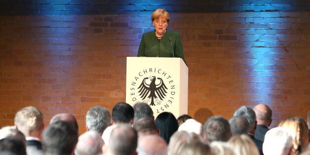 BERLIN, GERMANY - NOVEMBER 28: German Chancellor Angela Merkel attends the 60th anniversary of the BND ceremony at the substation on November 28, 2016 in Berlin, Germany. Bruno Kahl, President of the German Federal Intelligence Service (Bundesnachrichtendienst, or BND), speaks at an event to mark the 60th anniversary of the BND on November 28, 2016 in Berlin, Germany. The BND was originally established with the main task of spying against the Soviet Union and communist East Germany during the Cold War. Today it is primarily involved in fighting international terrorism. (Photo by Mika Schmidt - Pool/Getty Images)