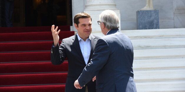MAXIMOU MANSION, ATHENS, ATTIKI, GREECE - 2016/06/21: Dialogue between Greek Prime Minister Alexis Tsipras (left) and of the President of European Commission Jean-Claude Juncker (right). After visiting President of Hellenic Republic Mr Prokopis Pavlopoulos, President of European Commission Jean-Claude Juncker met with Greek Prime Minister Alexis Tsipras to discuss for refugee issue and for the fact that the economical programme of Greece is after long time to the right path. (Photo by Dimitrios Karvountzis/Pacific Press/LightRocket via Getty Images)