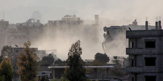 DAMASCUS, SYRIA - NOVEMBER 20: Smoke rises after the war crafts belonging to the Syrian Army carried out airstrikes on Arbin district of eastern Ghouta, Damascus, Syria on November 20, 2016. (Photo by Diaa Al Din/Anadolu Agency/Getty Images)