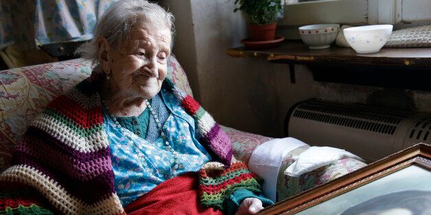 FILE - In this Friday, June 26, 2015 photo, Emma Morano, 116, sits in her apartment in Verbania, Italy. At 116 years of age, Emma is now the oldest person in the world and is believed to be the last surviving person in the world who was born in the 1800s, coming into the world on Nov. 29, 1899. Thatâs just 4 and a half months after Susannah Mushatt Jones, who died Thursday in New York at the age of 116. (AP Photo/Antonio Calanni, File)