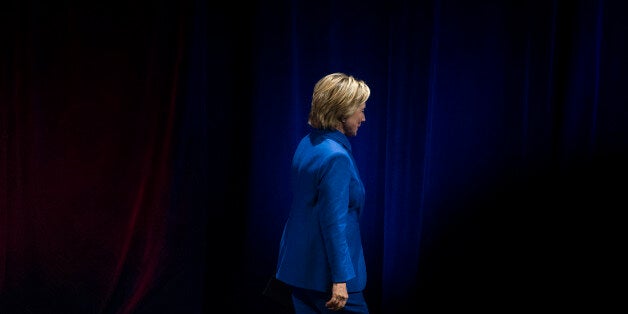 Hillary Clinton walks offstage after addressing the Children's Defense Fund's Beat the Odds celebration at the Newseum in Washington, Wednesday, Nov. 16, 2016. (AP Photo/Cliff Owen)