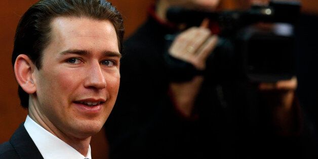 Austria's Foreign Minister Sebastian Kurz smiles during talks with Serbian Prime Minister Aleksandar Vucic, unseen, in Belgrade, Serbia, Tuesday, Feb. 9, 2016. Kurz is on a two-day official visit to Serbia. (AP Photo/Darko Vojinovic)