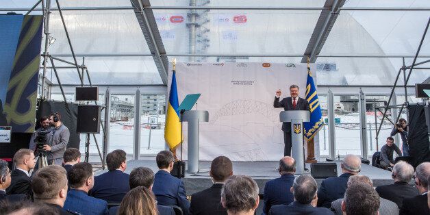CHERNOBYL, UKRAINE - NOVEMBER 29: President Petro Poroshenko of Ukraine speaks at a ceremony marking the positioning of the New Safe Confinement sarcophagus over Chernobyl nuclear power station's destroyed reactor number four on November 29, 2016 near Chernobyl, Ukraine. On April 26, 1986 workers at the Chernobyl nuclear power plant inadvertantly caused a meltdown in reactor number four, causing it to explode and send a toxic cocktail of radioactive fallout into the atmosphere in the world's wor