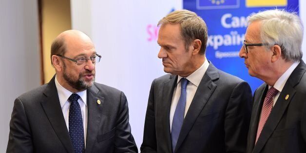 European Parliament President Martin Schulz (L) speaks with European Council President Donald Tusk (C) and European Commission President Jean-Claude Juncker while awaiting for Ukraine's President President Petro Poroshenko t arrive at the start of the 18th EU-Ukraine summit at the European Commission in Brussels on November 24, 2016.Schulz announced that he will step down from his office and return to national politics in elections next year. / AFP / EMMANUEL DUNAND (Photo credit should read EMMANUEL DUNAND/AFP/Getty Images)