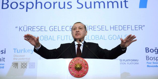 Turkey's President Recep Tayyip Erdogan addresses an economic meeting in Istanbul, Tuesday, Nov. 29, 2016. Erdogan says his country has not given up yet on the idea of EU accession but is actively pursuing alternatives. In televised remarks Tuesday, the Turkish president lamented that the