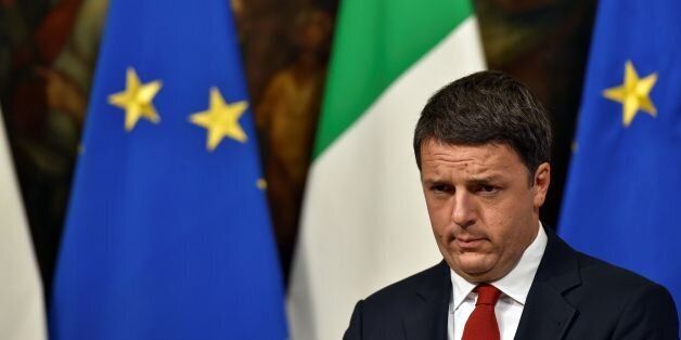 Italian Prime Minister Matteo Renzi reacts during a joint press conference with Italian Minister of Economy and Finance at Palazzo Chigi in Rome on November 28, 2016.European stock markets retreated on November 28, 2016, dragged down by falling banking stocks ahead of a crucial Italian referendum at the end of week. Tensions between Italian Prime Minister Matteo Renzi and the EU have reached a boiling point ahead of the referendum on constitutional reform on December 4, 2016. / AFP / Andreas SOLARO (Photo credit should read ANDREAS SOLARO/AFP/Getty Images)