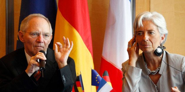 German Finance Minister Wolfgang Schauble, left, and France's Finance Minister Christine Lagarde attend a press conference after their meeting at Bercy Finance Ministry in Paris, Wednesday, July 21, 2010. (AP Photo/Francois Mori)