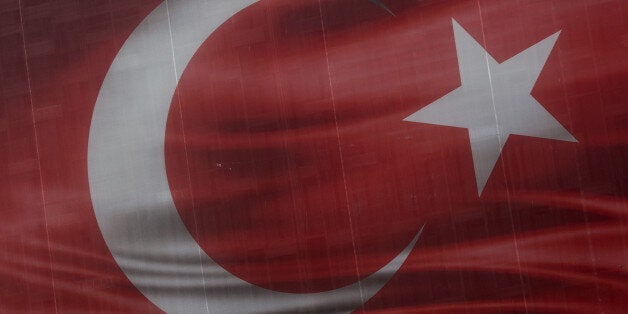 ISTANBUL, TURKEY - NOVEMBER 24: A Turkish national flag is seen on a billboard on November 24, 2016 in Istanbul, Turkey. European Parliament today voted to suspend Turkey's EU membership talks. Turkey's President Recep Tayyip Erdogan said the decision ' has no value for us.' The Turkish Lira has weakened significantly since the July 15th failed coup attempt forcing Turkey's central bank today to raise interest rates for the first time in nearly three years. (Photo by Chris McGrath/Getty Images