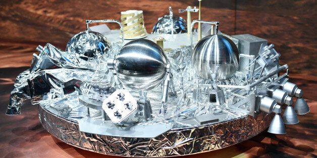 A model of SchiaparelliÂ· the mars landing device , is on display at the European Space Agency, ESA, in Darmstadt, Germany Wednesday Oct. 19, 2016. Schiaparelli will enter the martian atmosphere at an altitude of about 121 km and a speed of nearly 21 000 km/h. Less than six minutes later it will have landed on Mars. The probe will take images of Mars and conduct scientific measurements on the surface, but its main purpose is to test technology for a future European Mars rover. Schiaparelli's mother ship ,TGO, will remain in orbit to analyze gases in the Martian atmosphere to help answer whether there is or was life on Mars, ( Uwe Anspach/dpa via AP)