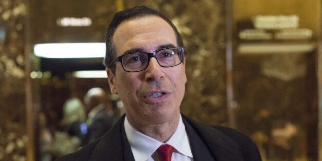 Steven Mnuchin, chief executive officer of Dune Capital Management LP, speaks to the media in the lobby of Trump Tower in New York, U.S., on Wednesday, Nov. 30, 2016. President-elect Donald Trump said Wednesday he plans to leave his business 'in total' to focus on the White House and will discuss the matter at a news conference Dec. 15 in New York with his children, some of whom are business associates. Photographer: Albin Lohr-Jones/Pool via Bloomberg