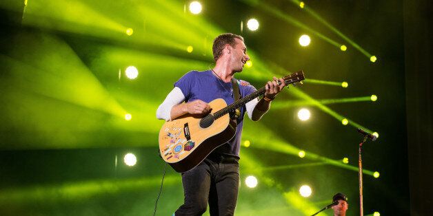 Chris Martin of Coldplay performs at The Budweiser Made In America Festival on Sunday, Sept. 4, 2016, in Philadelphia. (Photo by Michael Zorn/Invision/AP)