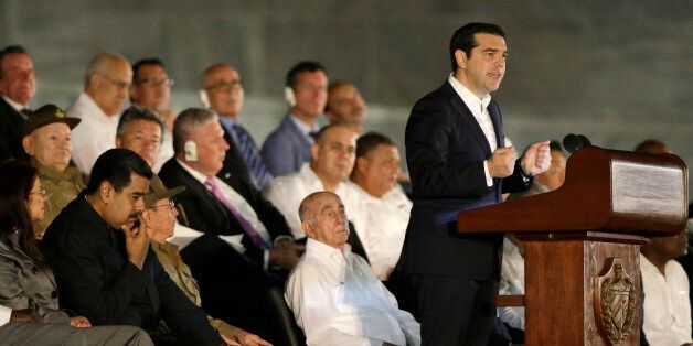 Greek Prime Minister Alexis Tsipras delivers a speech during a rally honoring Fidel Castro at the Revolution Plaza in Havana, Cuba, Tuesday, Nov. 29, 2016. Regional leaders and tens of thousands of Cubans filled Havana's Plaza of the Revolution Tuesday night for a service honoring Fidel Castro on the wide plaza where the Cuban leader delivered fiery speeches to mammoth crowds in the years after he seized power. (AP Photo/Ricardo Mazalan)