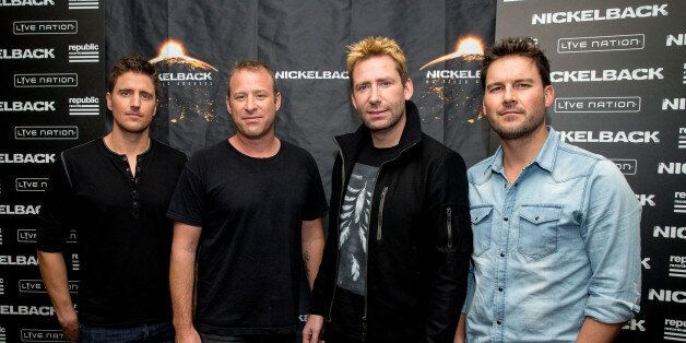 WEST HOLLYWOOD, CA - NOVEMBER 05: (L-R) Daniel Adair, Chad Kroeger, Mike Kroeger and Ryan Peake of Nickelback pose at the special announcement and live performance at the House of Blues on the Sunset Strip November 5, 2014 in West Hollywood, California. (Photo by Mark Davis/Getty Images)