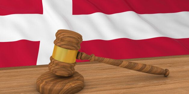 Danish Law Concept - Flag of Denmark Behind Judge's Gavel 3D Illustration