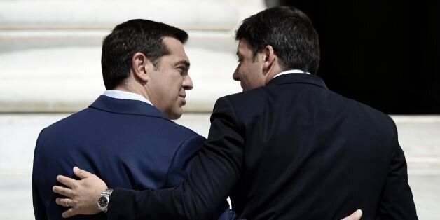 Greek Prime Minister Alexis Tsipras (L) welcomes his Italian counterpart Matteo Renzi during the opening of the EU MED Mediterranean Economies Summit in Athens on September 9, 2016. / AFP / ARIS MESSINIS (Photo credit should read ARIS MESSINIS/AFP/Getty Images)