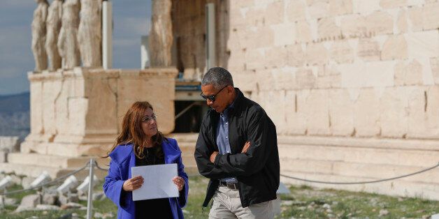 US President Barack Obama tours Acropolis with Dr. Eleni Banou, left, Director, Ephorate of Antiquities for Athens, Ministry of Culture, Wednesday, Nov. 16, 2016 in Athens. (AP Photo/Pablo Martinez Monsivais)