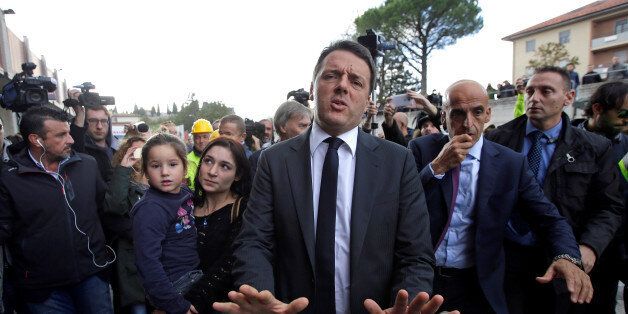 Italian Prime Minister Matteo Renzi arrives in Camerino after an earthquake in central Italy, October 27, 2016. REUTERS/Max Rossi