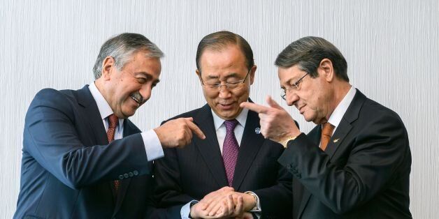 United Nations Secretary-General Ban Ki-Moon (C) prepares to handshake with Turkish Cypriot leader Mustafa Akinci (L) and Greek Cypriot President Nicos Anastasiades at the start of Cyprus Peace Talks on November 7, 2016 in Mont Pelerin, Western Switzerland where Cyprus' Greek and Turkish speaking communities will conduct a key phase of reunification talks, under the aegis of the United NationsProspect of Cyprus solution 'within reach'said UN chief Ban Ki-Moon on November 7, 2016. / AFP / POOL / FABRICE COFFRINI (Photo credit should read FABRICE COFFRINI/AFP/Getty Images)