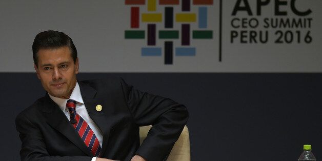 Mexico's President Enrique Pena Nieto takes part in a session of the APEC CEO Summit, part of the broader Asia-Pacific Economic Cooperation (APEC) Summit in Lima on November 19, 2016.Chinese President Xi Jinping urged Asia-Pacific leaders earlier at the summit on November 19 to get on board with Beijing-backed free trade agreements, after Donald Trump's election win spelled the likely demise of a US-backed deal. / AFP / Rodrigo BUENDIA (Photo credit should read RODRIGO BUENDIA/AFP/Getty Images)