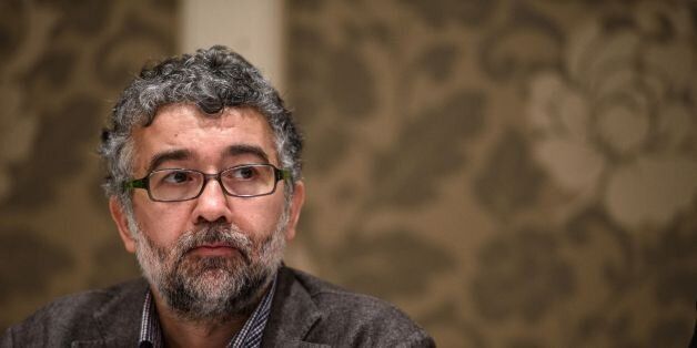 A picture taken on March 2, 2016 shows Erol Onderoglu, the Turkey representative for international rights group Reporters Without Borders (RSF), during a press meeting in Istanbul.Turkey arrested the local representative of international rights group Reporters Without Borders (RSF) on 'terrorist propaganda' charges on June 20, in the latest crackdown on the media in the country. Erol Onderoglu as well as journalist Ahmet Nesin and rights activist and academic Sebnem Korur Fincanci, were charged after taking part in a campaign of solidarity with a pro-Kurdish newspaper in May. / AFP / OZAN KOSE (Photo credit should read OZAN KOSE/AFP/Getty Images)