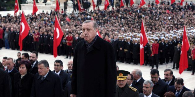Turkey's President Recep Tayyip Erdogan visits before thousands of students and citizens walk to the mausoleum to remember the nation's founding father Mustafa Kemal Ataturk on the 78th anniversary of his death, in Ankara, Turkey, Thursday, Nov. 10, 2016.(AP Photo/Burhan Ozbilici)