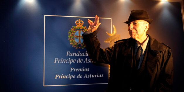 Canadian singer-songwriter Leonard Cohen poses for photographers after arriving in Oviedo, northern Spain, October 18, 2011. Cohen will be awarded with the 2011 Prince of Asturias Award for Literature at a traditional ceremony on Friday in the Asturian capital. The Prince of Asturias Awards are held annually since 1981 to reward scientific, technical, cultural, social and humanitarian work done by individuals, work teams and institutions. REUTERS/Eloy Alonso (SPAIN - Tags: SOCIETY ENTERTAINMENT)