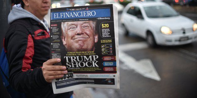 A Mexican newspaper with its front page referring to the eventual triumph of US presidential candidate Donald Trump on November 9, 2016 in Mexico City. / AFP / YURI CORTEZ (Photo credit should read YURI CORTEZ/AFP/Getty Images)