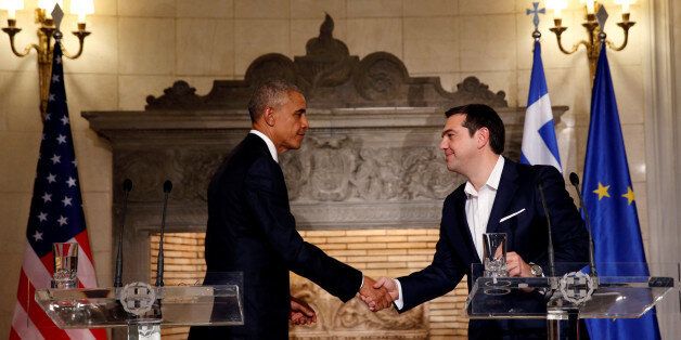 U.S. President Barack Obama and Greek Prime Minister Alexis Tsipras shake hands at the end of a press conference at Maximos Palace in Athens, Greece November 15, 2016. REUTERS/Kevin Lamarque