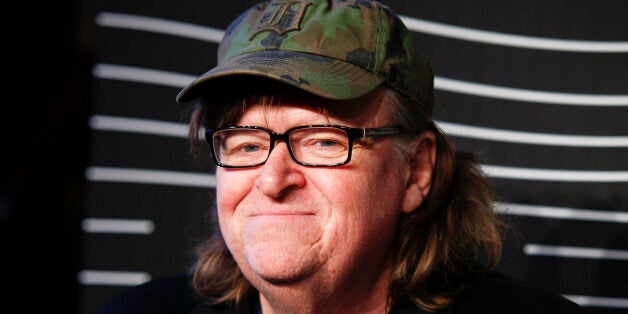 FILE - In this May 16, 2016 file photo, Michael Moore attends the 20th Annual Webby Awards at Cipriani Wall Street in New York. Moore premiered a surprise film about the U.S. presidential election on Tuesday, Oct. 18, 2016.