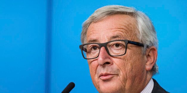 European Commission President Jean-Claude Juncker addresses the media after the first day of an EU summit in Brussels early Friday, Oct. 21, 2016. European Union leaders pledged early Friday to keep all options open to respond to any atrocities committed by President Bashar Assad's regime and his Russian backers in Syria but stopped short of threatening to impose sanctions. (AP Photo/Geert Vanden Wijngaert)