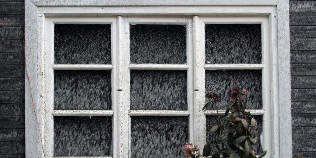 A window is partially covered with ashes near San Carlos de Bariloche, Rio Negro, Argentina, on June 7, 2011, three days after the eruption of Chile's Puyehue volcano, located 870 km south of Santiago in the Andes mountains. Dozens of South American flights had to be scrapped Tuesday because of the huge cloud of volcanic ash spewing from a Chilean volcano, as fears grew of possible landslides near the eruption. So far 4,000 people have been evacuated from 22 rural Chilean communities surrounding