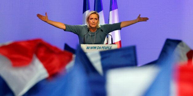 Marine Le Pen, French National Front (FN) political party leader, gestures during an FN political rally in Frejus, France, September 18, 2016. REUTERS/Jean-Paul Pelissier