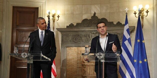 US President Barack Obama (R) shakes hands with Greek Prime Minister Alexis Tsipras before their meeting on November 15, 2016 in Athens. / AFP / Brendan Smialowski (Photo credit should read BRENDAN SMIALOWSKI/AFP/Getty Images)