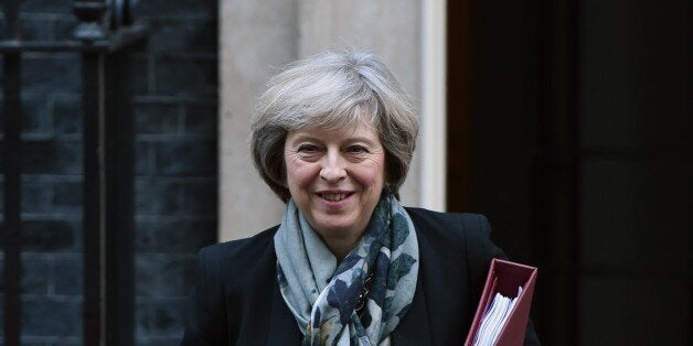 LONDON, UNITED KINGDOM - NOVEMBER 16: British Prime Minister Theresa May departs No.10 Downing street for Prime Minister's Question (PMQ) at the House of Commons, in London, England on November 16, 2016. (Photo by Kate Green/Anadolu Agency/Getty Images)