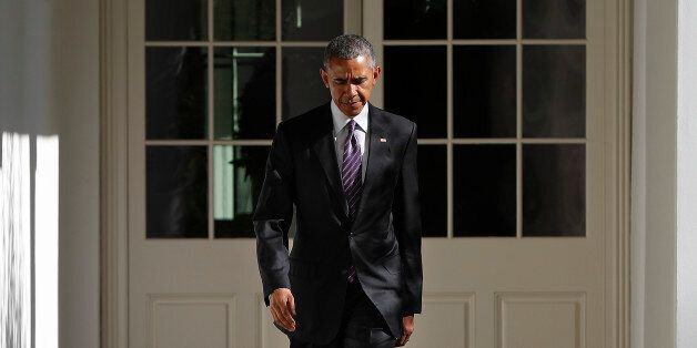 President Barack Obama walks down the White House Colonnade from the main residence to the Oval Office, Tuesday, Nov. 8, 2016, in Washington. (AP Photo/Pablo Martinez Monsivais)