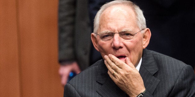 Germany's Finance Minister Wolfgang Schauble arrives for the Eurogroup finance ministers meeting at the EU Council building in Brussels on Thursday, Feb. 11, 2016. (AP Photo/Geert Vanden Wijngaert)