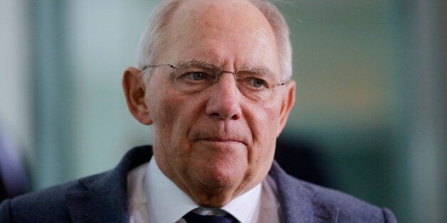 German Finance Minister Wolfgang Schaeuble arrives for the weekly cabinet meeting of the German government at the chancellery in Berlin, Germany, Wednesday, Oct. 19, 2016. (AP Photo/Markus Schreiber)
