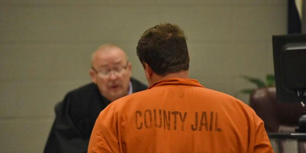 Todd Kohlhepp is addressed by Judge Jimmy Henson during a bond hearing at the Spartanburg Detention Facility, in Spartanburg, S.C. Sunday, Nov. 6, 2016. The judge denied bond for Kohlhepp, charged with a 2003 quadruple slaying and more recently holding a woman captive on his property. (AP Photo/Richard Shiro)