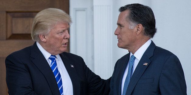 BEDMINSTER TOWNSHIP, NJ - NOVEMBER 19: (L to R) President-elect Donald Trump shakes hands with Mitt Romney after their meeting at Trump International Golf Club, November 19, 2016 in Bedminster Township, New Jersey. Trump and his transition team are in the process of filling cabinet and other high level positions for the new administration. (Photo by Drew Angerer/Getty Images)