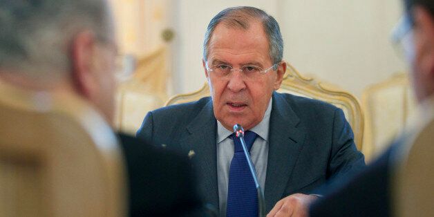 Russian Foreign Minister Sergey Lavrov speaks to his Cyprus' counterpart Ioannis Kasoulides, left, during their meeting in Moscow, Russia, on Monday, Oct. 31, 2016. (AP Photo/Ivan Sekretarev)
